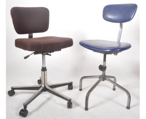 Two retro vintage mid 20th Century industrial factory machinist chairs comprising an example on tubular legs and another on c