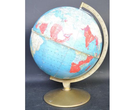 A mid 20th century retro vintage circa. 1960's table top spinning globe modelled from papier mache and held upon a metal moun