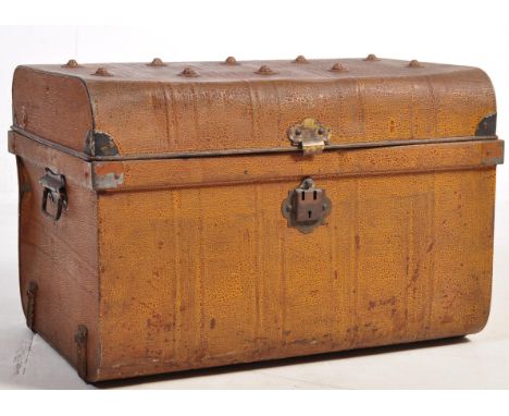 An early 20th century metal Naval Merchant Navy steamer trunk with studded lid and black swing handles to sides. Measures app