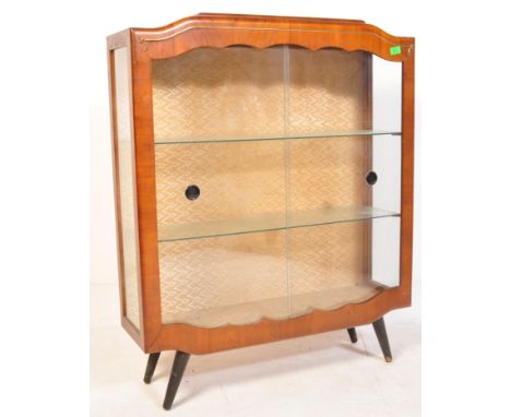 A retro vintage mid 20th Century circa 1950's walnut display / china cabinet. The cabinet having an arched rectangular top, w