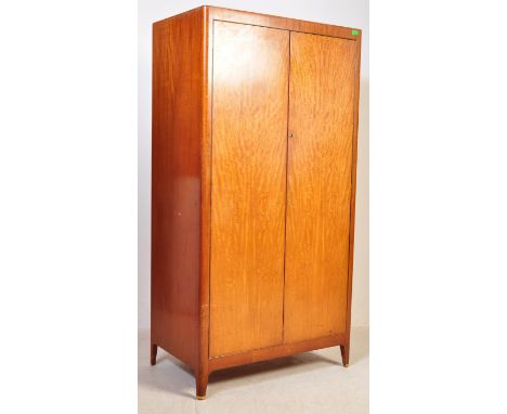 A large retro vintage mid 20th Century walnut revival wardrobe - in the manner of heals. Having twin large doors opening to r