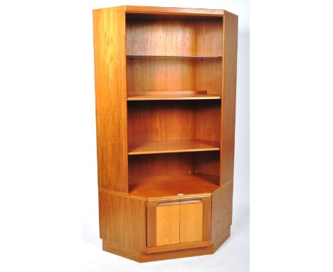 G-Plan - A retro vintage 20th Century teak wood corner cabinet / bookcase display unit having a glass and teak shelves set to