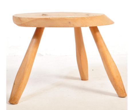 A retro vintage mid 20th Century living edge rustic teak small / occasional table. Having a small bark form with round legs. 