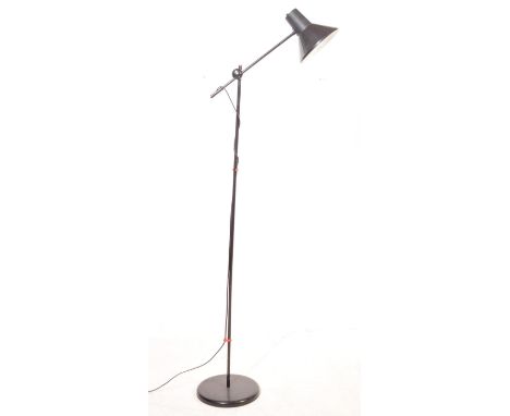 A retro vintage mid 20th century reading light having an ebonised colourway. The lamp having a conical shade, two arm support