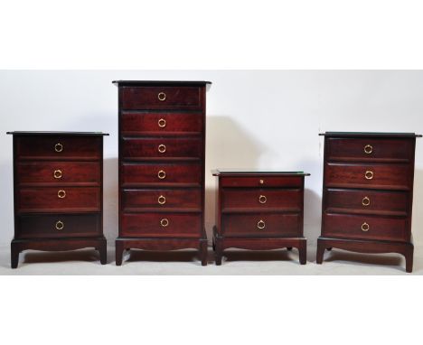 A collection of vintage 20th century Stag Minstrel bedroom furniture comprising two dressing chests having a run of three dra