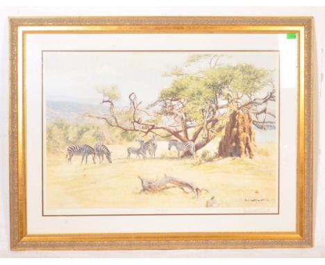 After Donald Grant - Zebras Grazing -&nbsp; A vintage mid 20th century print of zebras grazing on a savannah. Framed and glaz