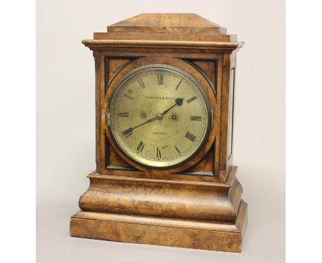 A VICTORIAN WALNUT CASED BRACKET CLOCK BY THWAITES AND REED. A fine Victorian walnut cased bracket clock with a silvered dial