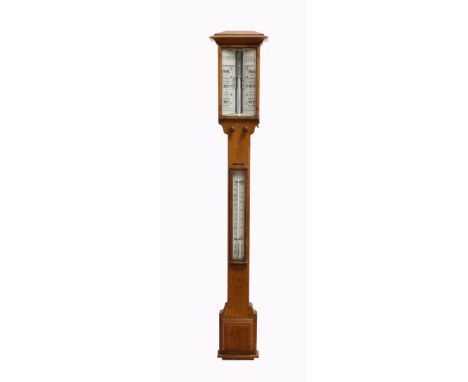 A VICTORIAN OAK STICK BAROMETER BY WRIGHT &amp; CO. WESTMINSTER The oak column with architectural top above an engraved gauge