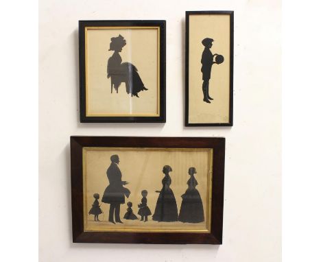 A VICTORIAN SILHOUETTE AND TWO OTHERS. A large silhouette portrait of a family, with three young children, signed lower left 