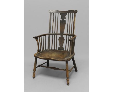 AN ASH AND ELM WINDSOR CHAIR, 19th century, the wavy top rail above straight comb back and solid seat on turned supports with