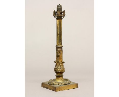 A VICTORIAN GILT BRASS TABLE CANDLE STICK. A mid Victorian brass adjustable table candlestick of adjustable column form with 