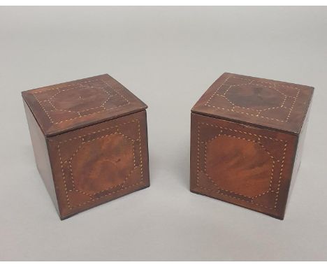 A PAIR OF GEORGE III MAHOGANY TEA CADDIES. A pair of George III tea canisters of cube form, veneered in mahogany with checker