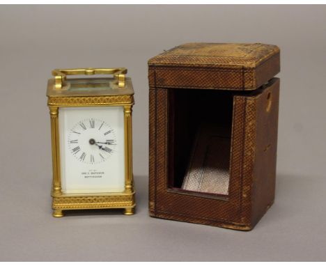 A VICTORIAN BRASS CARRIAGE CLOCK BY BUTCHER OF NOTTINGHAM. A Victorian brass cased carriage clock with column effect uprights