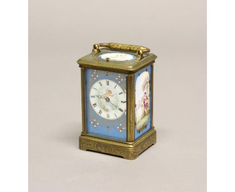 A 19TH CENTURY FRENCH PORCELAIN MOUNTED CARRIAGE CLOCK. A brass cased carriage clock with all over engraved scrolling decorat
