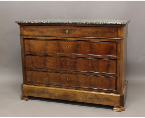 A FRENCH EMPIRE STYLE MARBLE TOPPED COMMODE, the rectangular marble top above a long frieze drawer and three further drawers 