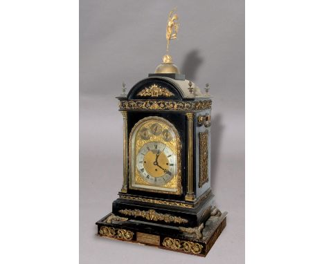 A LARGE GEORGE II STYLE BRACKET CLOCK BY J.C. TURNER OF LONDON. The arch topped dial with silvered chapter ring beneath subsi