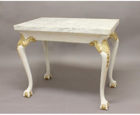 A MARBLE TOPPED CONSOLE TABLE, 20th century, the painted base with gilt detailing on ball and claw feet, 81cm high, 98cm wide