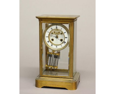A 19TH CENTURY FRENCH FOUR GLASS MANTLE CLOCK. A gilt brass cased 'four glass' mantle clock with a two part dial with Roman n