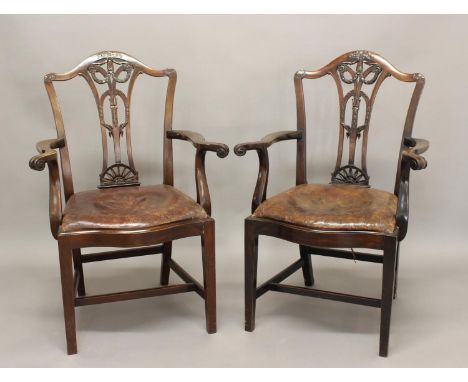 PAIR OF CHIPPENDALE STYLE MAHOGANY ARMCHAIRS, the pierced splats with moulded swag and ribbon decoration above leather drop-i