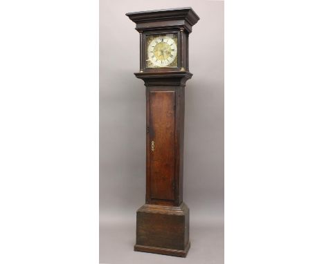 AN OAK CASED 30 HOUR LONGCASE CLOCK BY HOW. With an 11" brass dial with silvered chapter ring, engraved with a scene of a bla