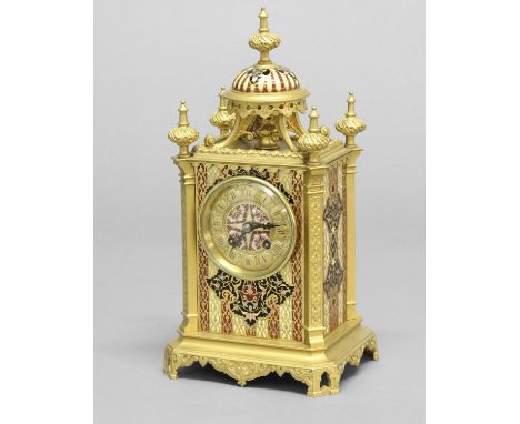 A VICTORIAN GILT BRASS AND ENAMEL MANTLE CLOCK. A decorative Victorian mantle clock with circular dial and an eight day two t
