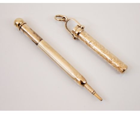 A yellow metal Sampson & Morden propelling pencil, the engine turned decorated pencil with ball shaped terminal, cased within