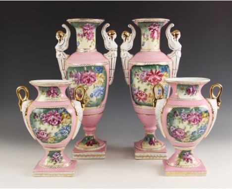 A pair of Paris porcelain style vases, 20th century, of urn form with twin handles modelled as angels, the bodies enamelled w