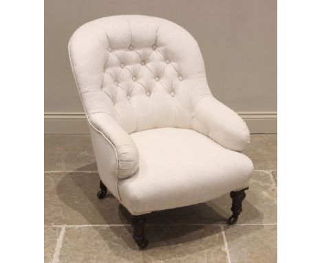 A Victorian tub chair, later re-upholstered, the arched button back over a bowfront seat upon turned walnut front legs, plain