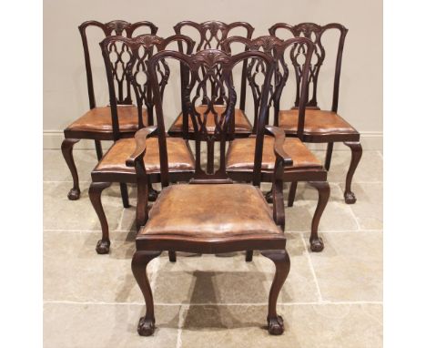 A set of six mahogany Chippendale revival dining chairs, early 20th century, each with an interlaced openwork splat back over