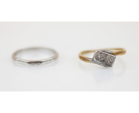 A mid 20th century white metal wedding band, the band of decagon form with alternating engraved sides, stamped L&amp;W PLAT, 