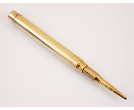 A 9ct yellow gold Sampson Mordan 'drop' pencil, the plain polished barrel with push mechanism revealing engine turned pencil 