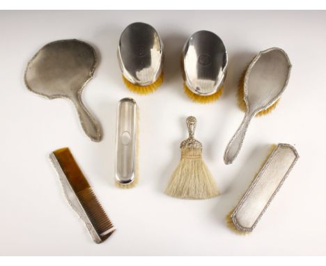 A pair of George V silver backed brushes, S Blanckensee and Sons Ltd, Birmingham 1932, with engine turned decoration and init