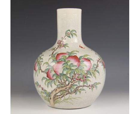 A Chinese porcelain peach bloom vase, 20th century, the tianqiuping shaped globular vase externally decorated with blossoming