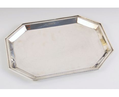 A George V silver tray, T Wilkinson and Sons, Birmingham 1928, of plain polished octagonal form with stepped border, 30cm wid