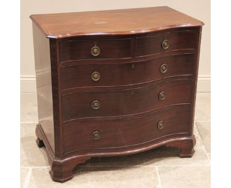 A Chippendale revival serpentine mahogany chest of drawers, 19th century, the moulded top above an arrangement of two short a