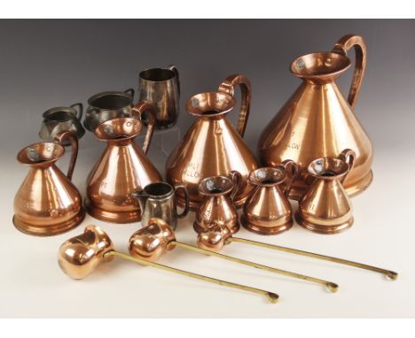 A collection of seven haystack copper measures, late 19th/early 20th century, each applied with a 'H R' lead excise seal, ran