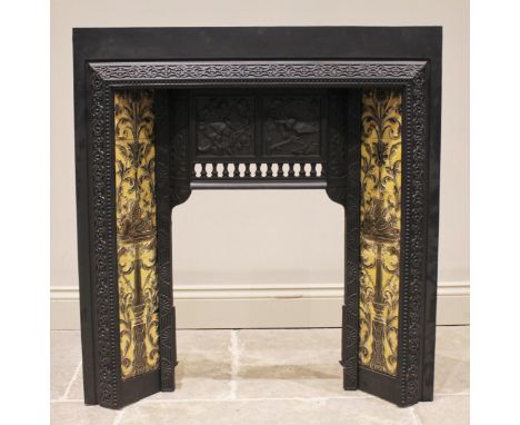 A cast iron tile back fire surround, early 20th century, impressed 'The Salisbury, No.145' to the rear, the four glazed Minto