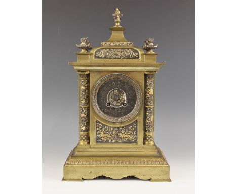 A French brass mantel clock, 19th century, by Achille Brocot, the architectural case with flaming urn finials over the 9cm di