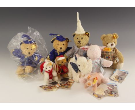 A collection of nine Steiff soft toys from the "Family", "Baby" and "Classic" ranges, to include a "Zauberbarle 25 mit Kleid"