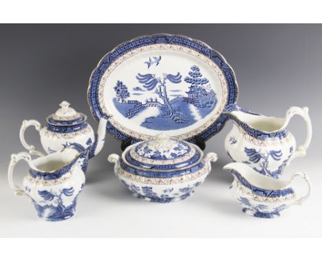An extensive collection of Booth's 'Real Old Willow' blue and white tea, dinner and coffee service, to include seven vegetabl