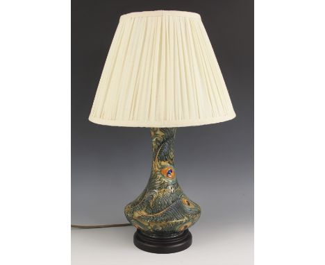 A Moorcroft table lamp in the "Peacock" pattern designed by Rachel Bishop, on turned wooden base, 32cm high, 56cm high with s