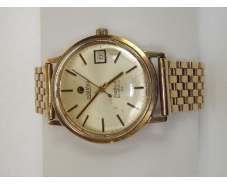 A very rare gentleman's wristwatch, Roamer Lime Light automatic 23 - 9ct gold case and strap. Gold hands and batons with date