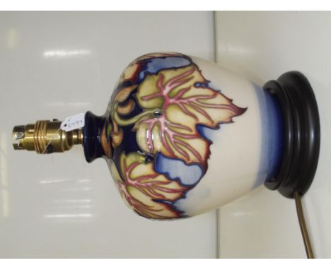 Moorcroft pottery trial design table lamp, bulbous form on a plinth base, height 27cm excluding shade