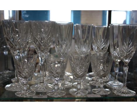 A shelf of cut glass crystal glasses collection only 