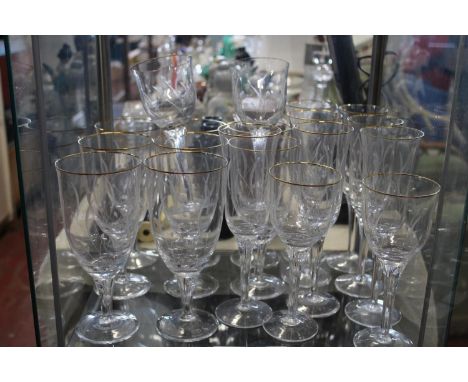 A shelf of vintage etched drinking glasses collection only 