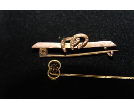 A 9ct gold horseshoe bar brooch &amp; stick pin 1.2 grams total 