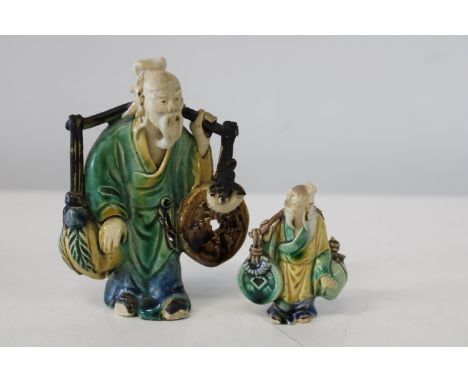 Two Chinese ceramic figures. Tallest is 12cm tall 