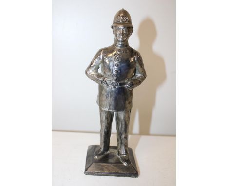 A vintage Policeman themed table lighter h22cm 