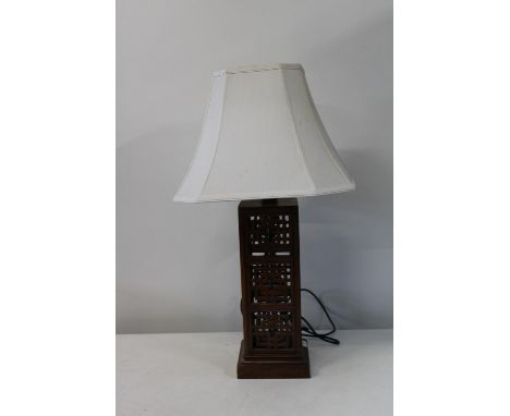 A Chinese wooden table lamp (h48cm without shade) 