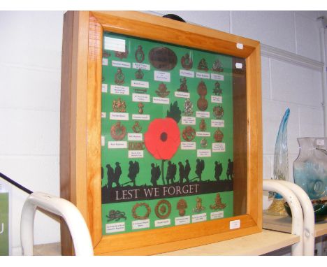 A case of Army Regiment badges 